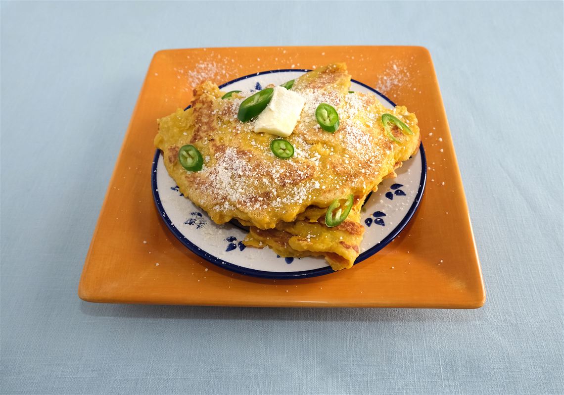 Cachapas (Venezuelan corn cakes) from the cookbook “The Kitchen Without Borders: Recipes and Stories from Refugee and Immigrant Chefs.”                                                                                                                                                                                                                                          