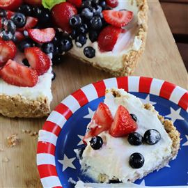 A no-bake cheesecake made with ricotta, cream cheese and sugar makes easy work for dessert on the Fourth of July.  