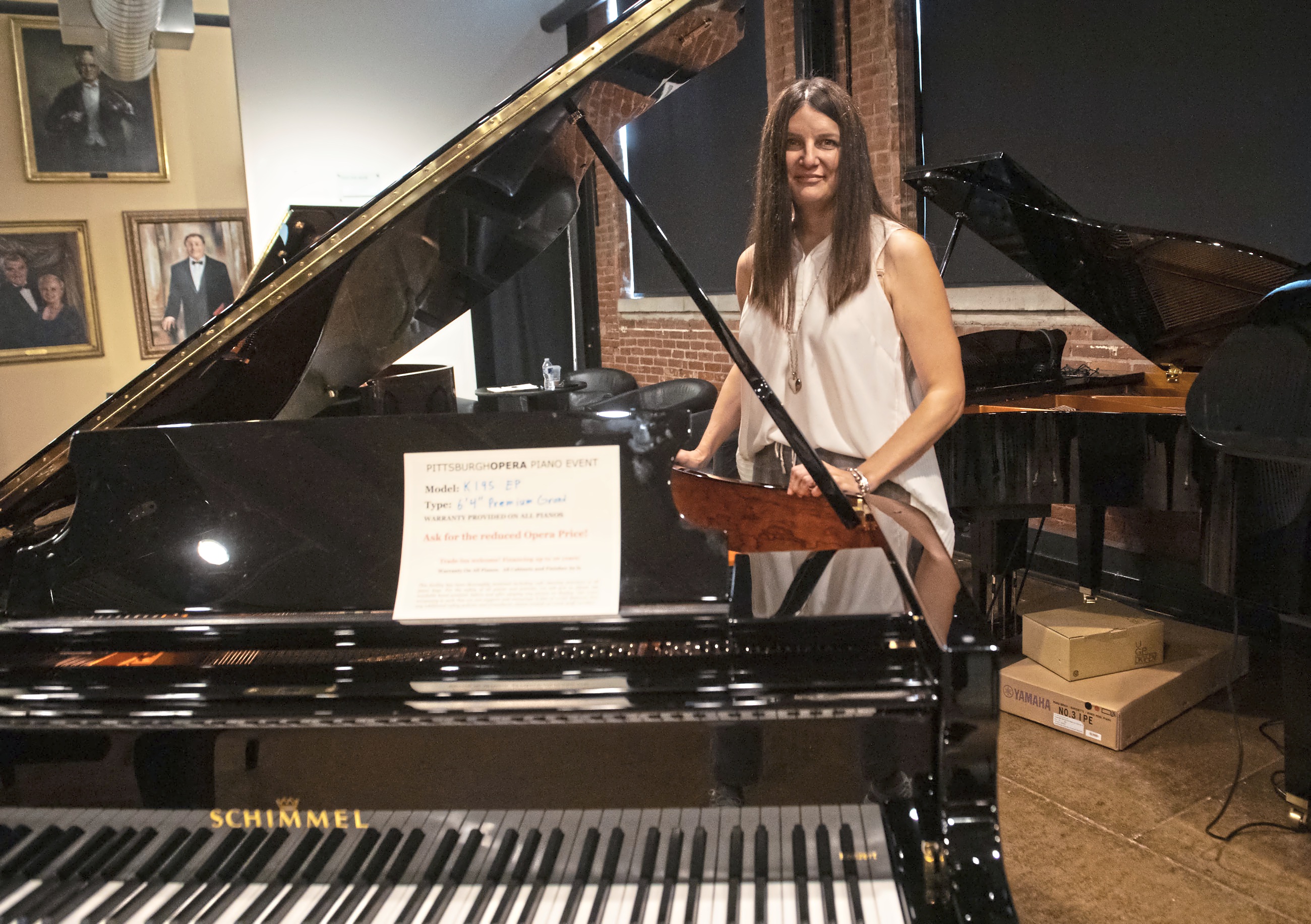 Tickling the keys at the Pittsburgh Opera piano sale | Pittsburgh